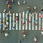 Pedestrian crossing top view. Crosswalk aerial from drone.